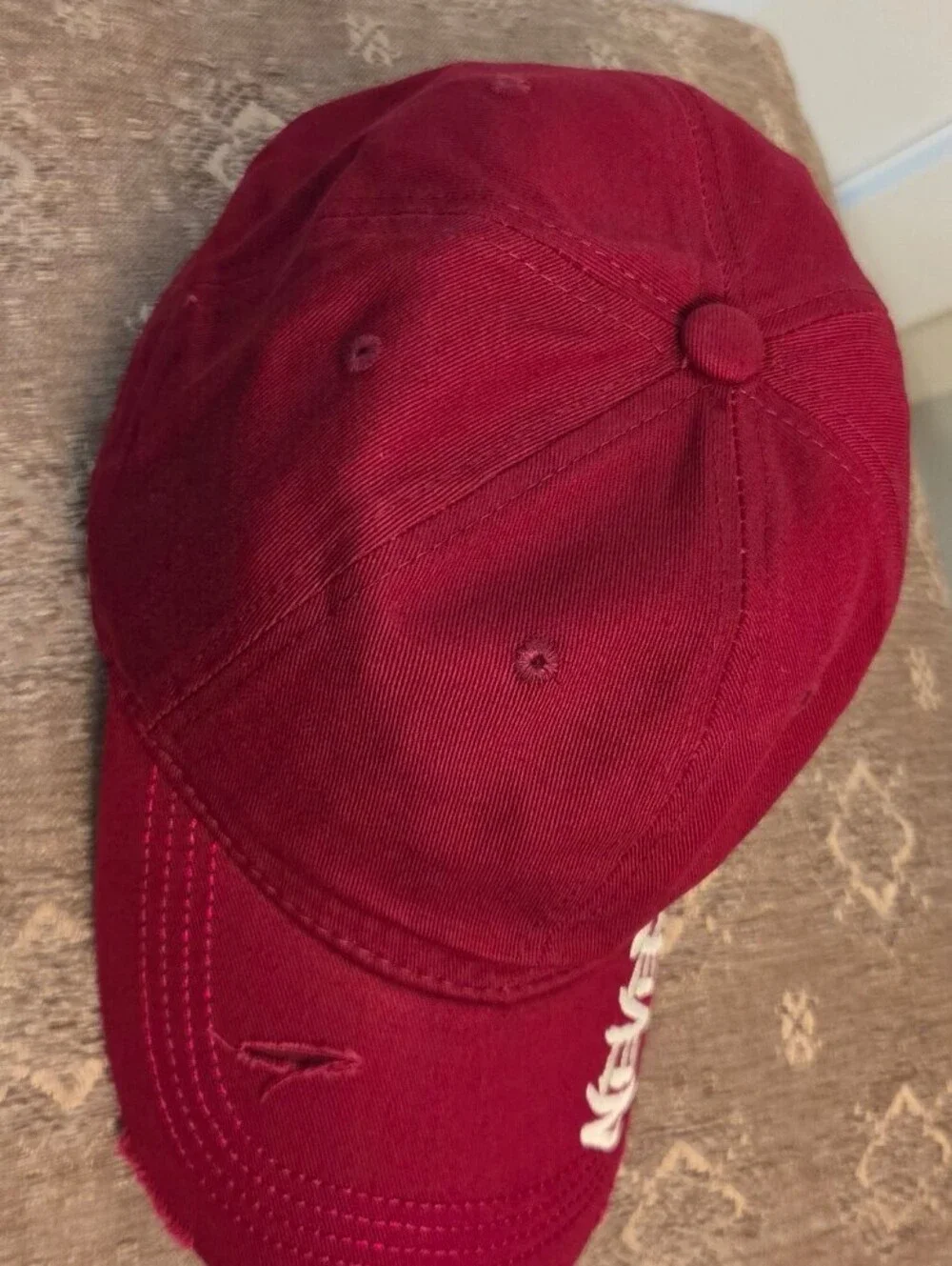 Maroon Baseball Cap with 'Never Give Up' Embroidery